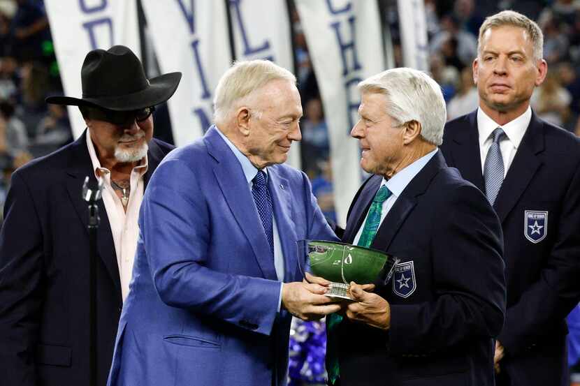 Dallas Cowboys owner Jerry Jones presents former Cowboys coach Jimmy Johnson with a Ring of...