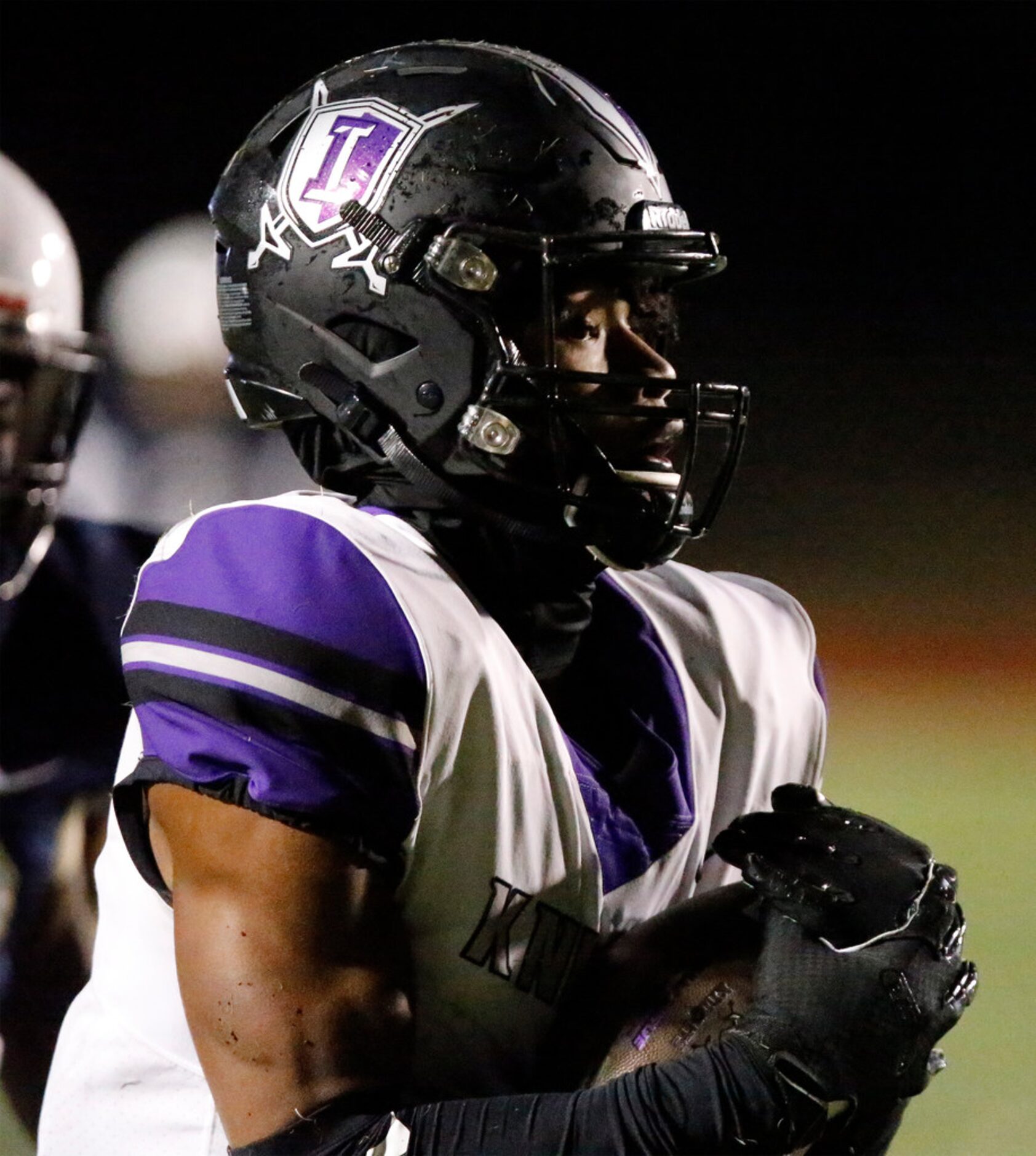 Independence High School wide receiver Khiyon Wafer (4) pulls in a long pass that would set...