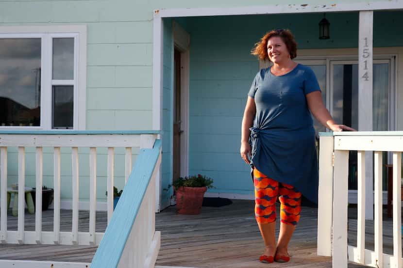 Mona Hochman of Galveston at her little green cottage: "I've had a new roof a few times in...