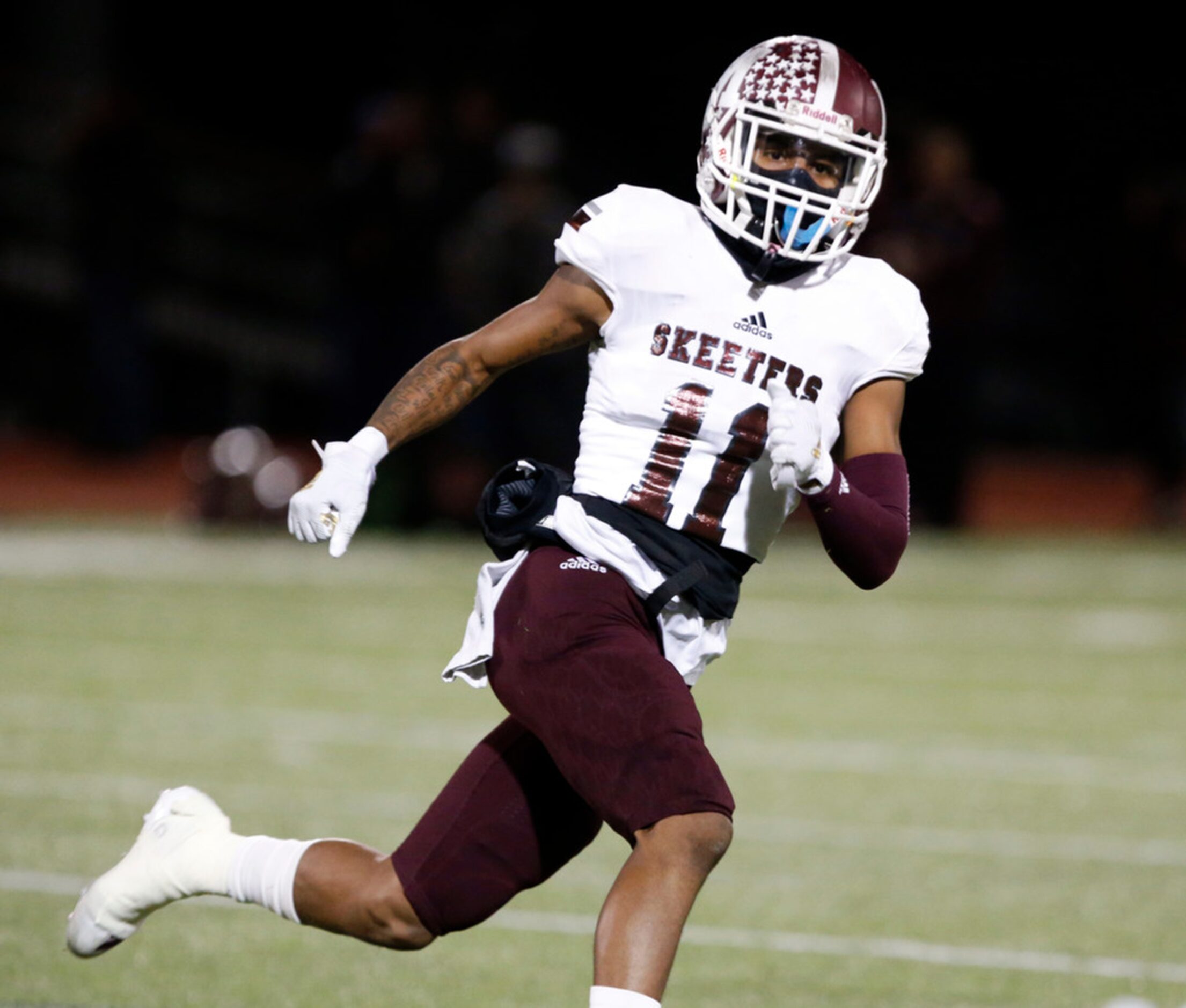 Mesquite defender Dewayne Adams (11) crosses the field to help make a tackle during the...