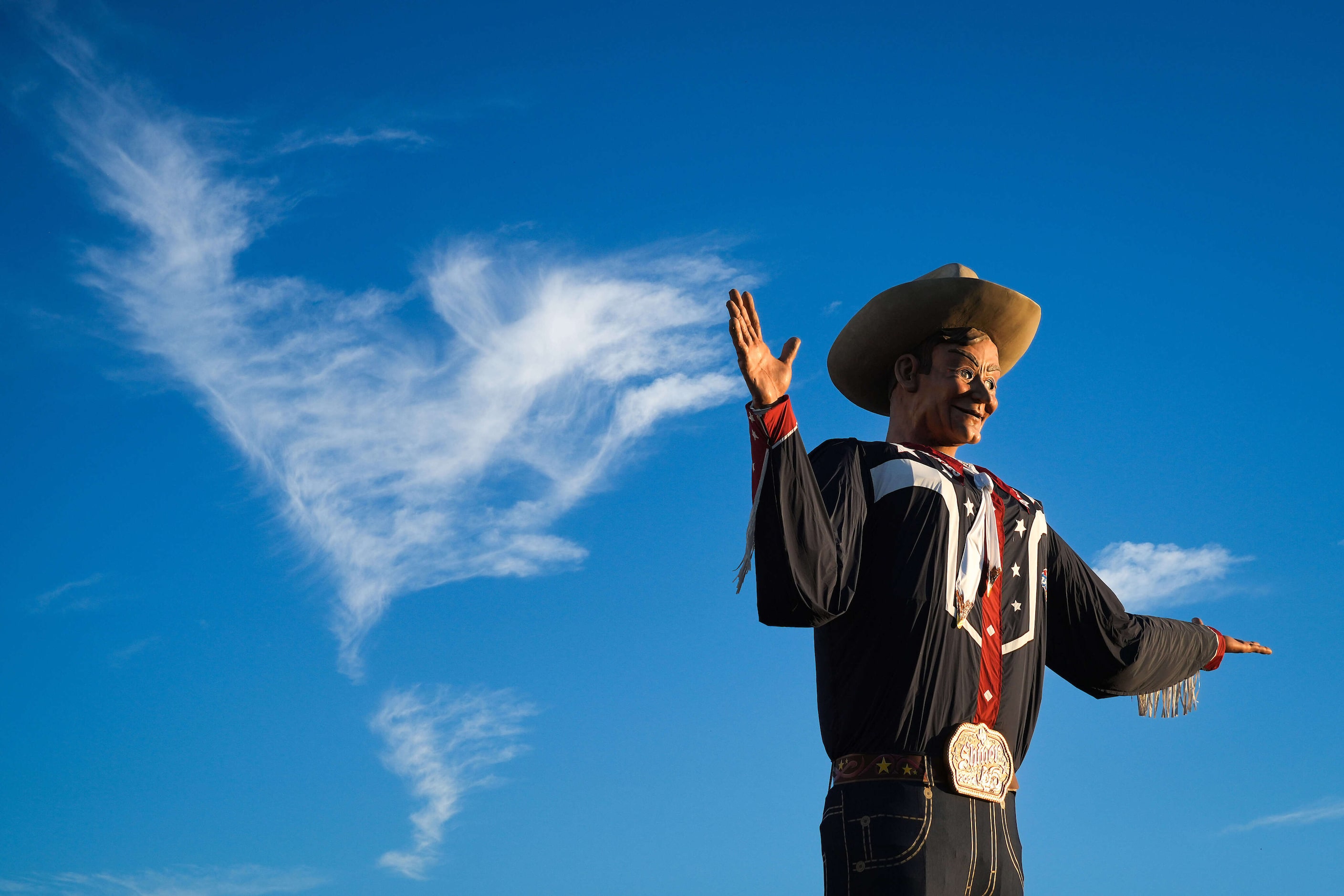 Evening sunlight highlights Big Tex at the State Fair of Texas on Sunday, Sept. 29, 2024, in...