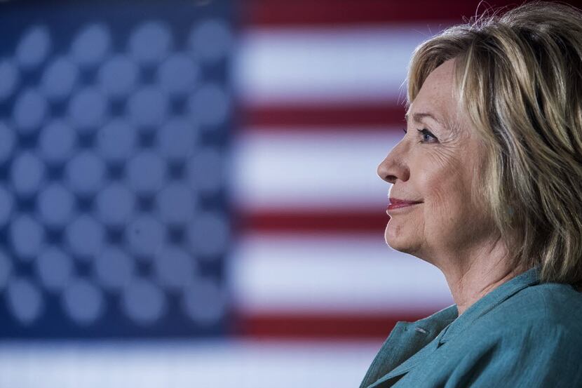Hillary Clinton, 2016 Democratic presidential nominee, listens during a campaign event in...