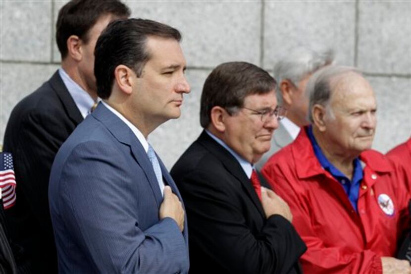  Sen. Ted Cruz, R-Texas, left, and Rep. Michael Burgess, R-Lewisville, visit with Texas...