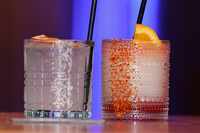 The top-shelf margarita (left) and Chido Uber — similar to a Mambo Taxi, with a...
