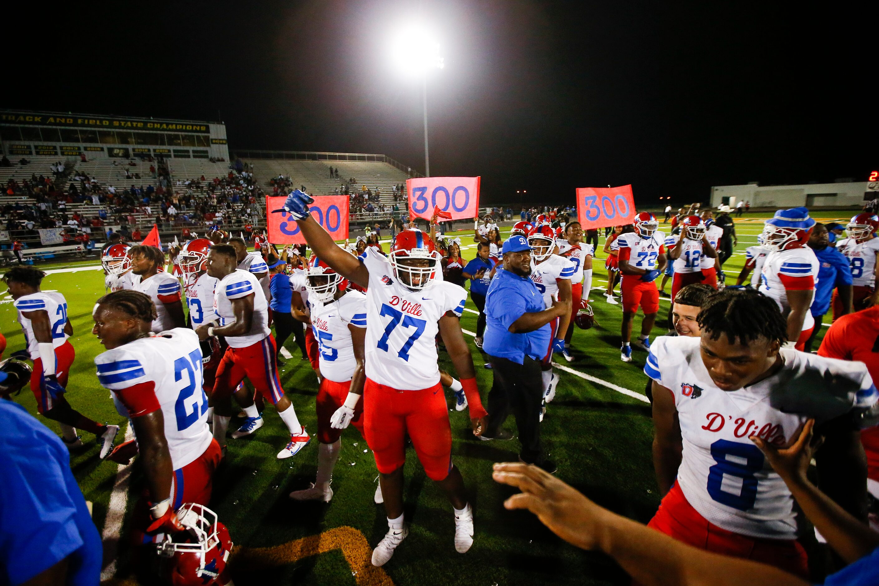 Duncanville celebrates a 42-21 win over DeSoto after a high school football game at DeSoto...