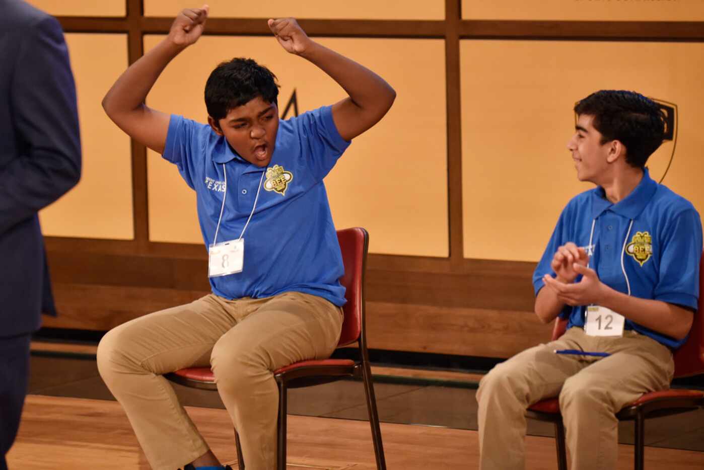 Rohan Raja (left) celebrates after Saturday's regional spelling bee in Dallas after earning...