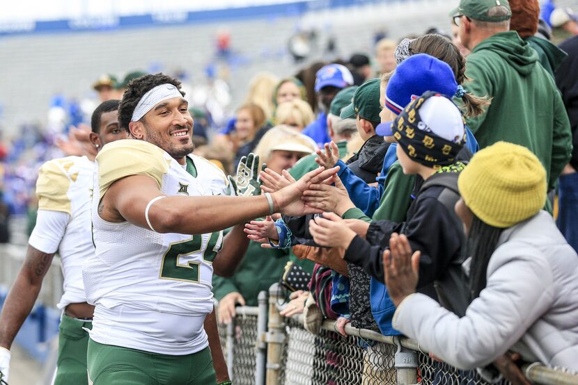 LAWRENCE, KS - NOVEMBER 04: Tight end Ishmail Wainright #24 of the Baylor Bears celebrates...