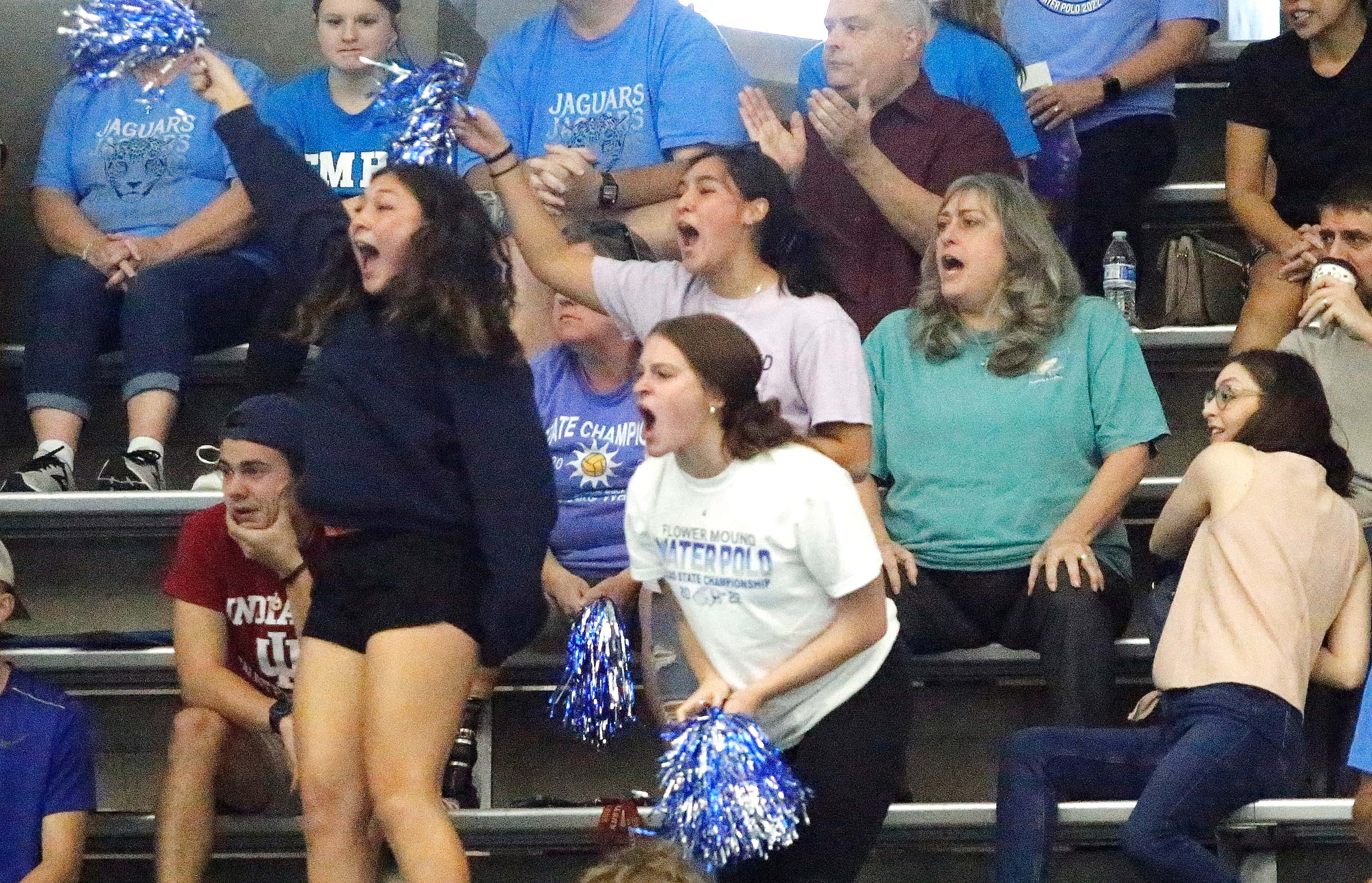 Flower Mound High School fans react to a play in the first half as Southlake High School...