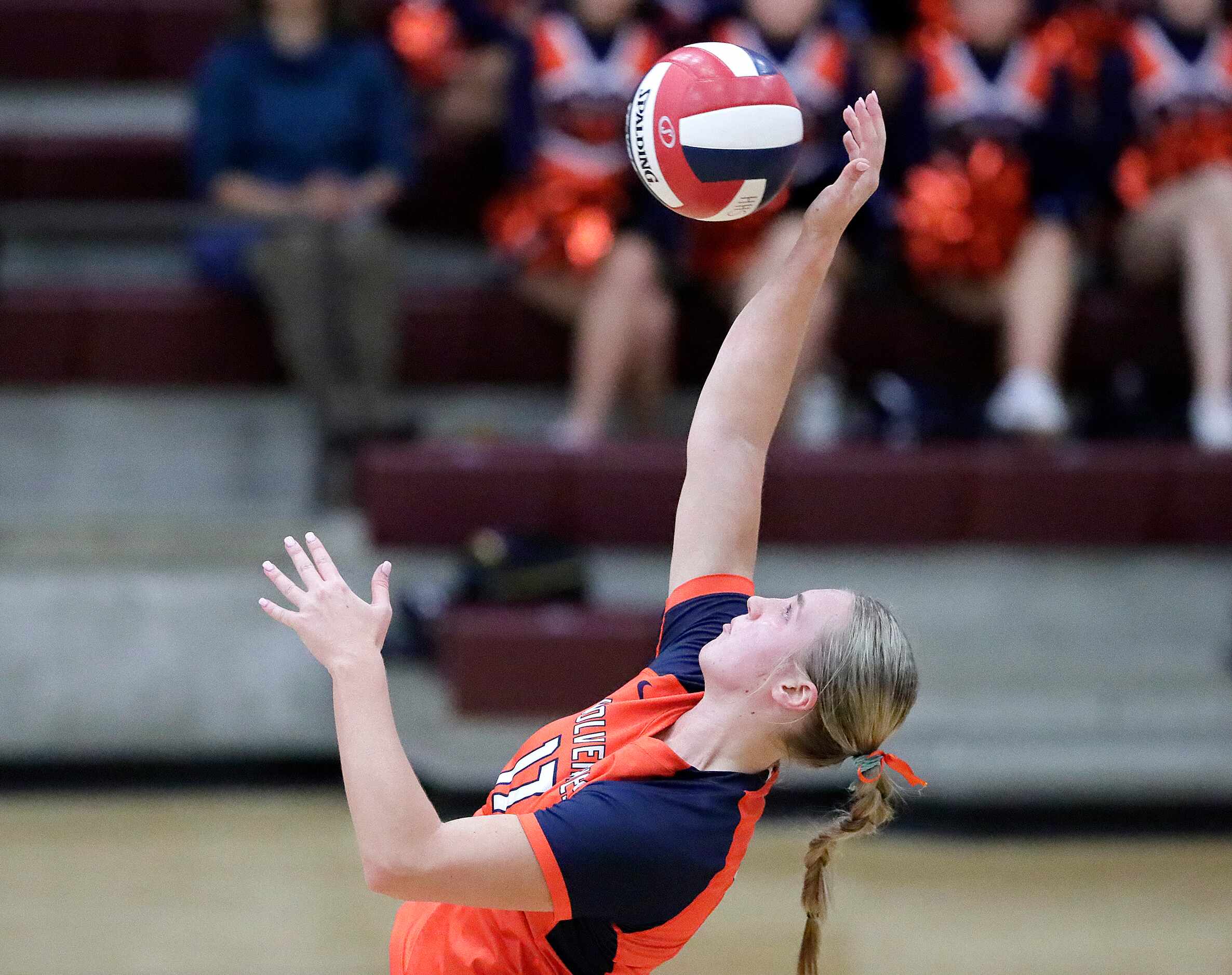 Wakeland High School outside hitter Kealakai Bandy (17) gets a hit during game one as...