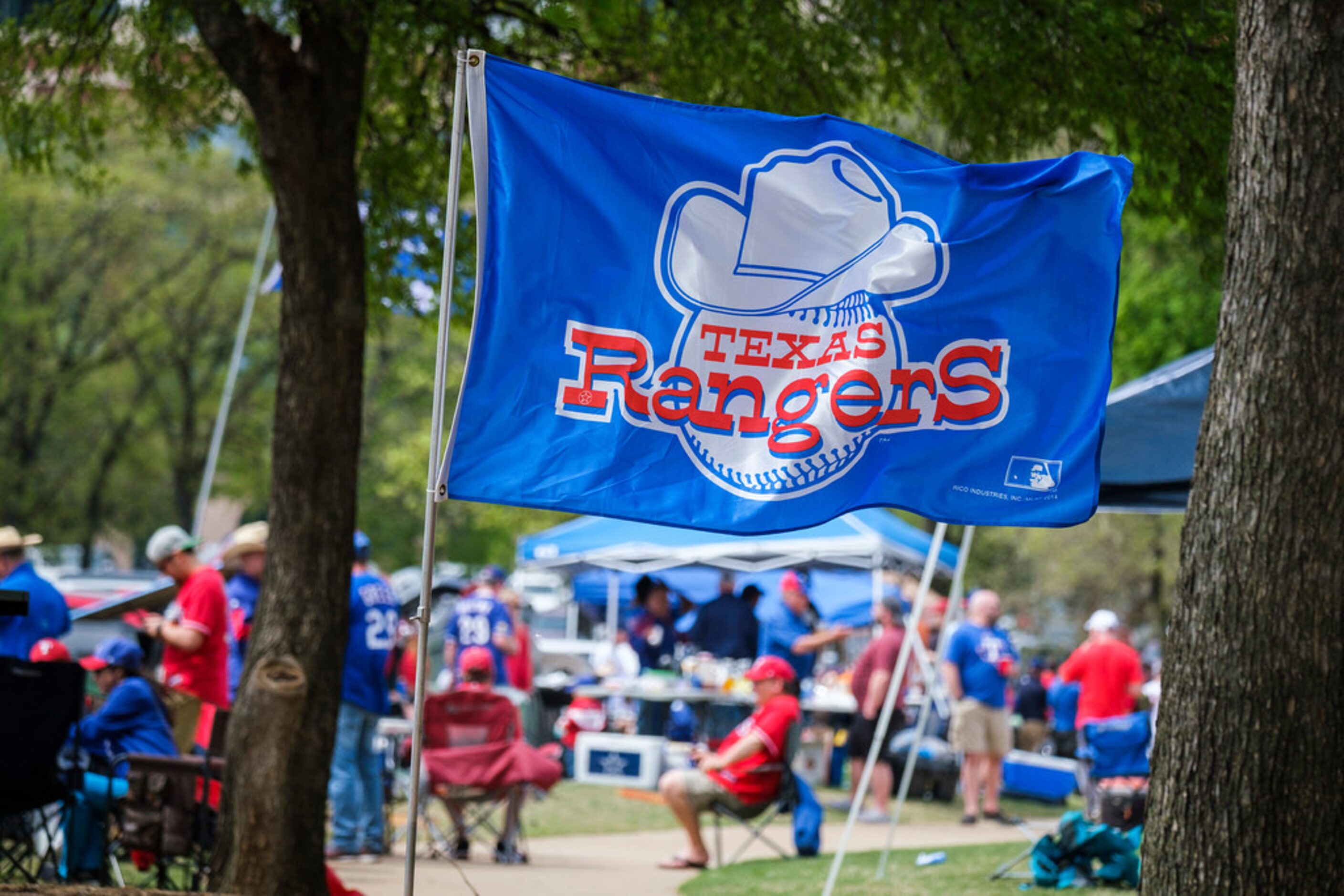 Texas Rangers fans tailgate before the Texas Rangers opening day game against the Chicago...