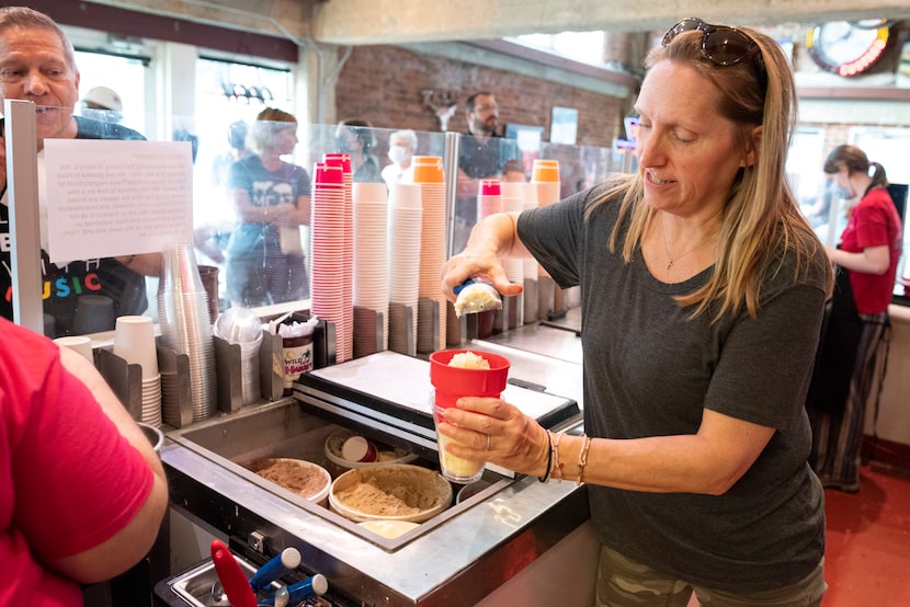 President of operations Sydney Coley-Berglund prepares a vanilla concrete with Oreos at Wild...