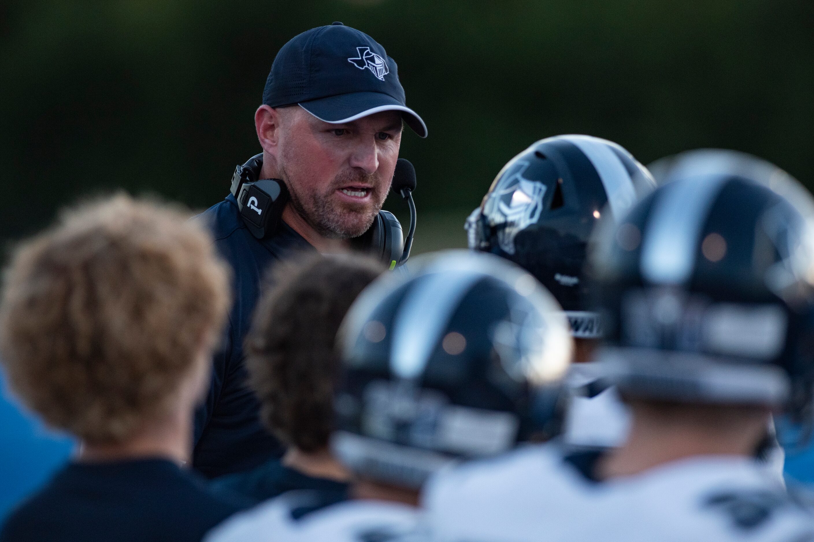 Argyle Liberty Christian Head Coach Jason Witten talks to his players during Parish...