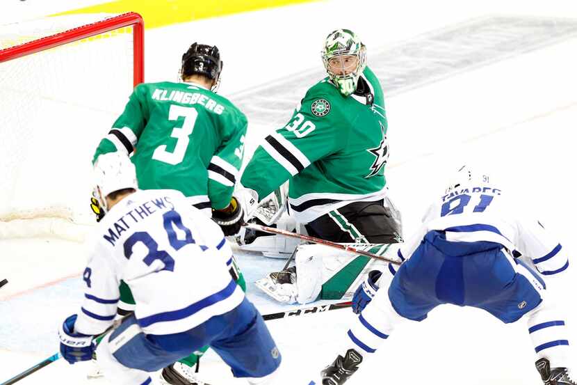 Dallas Stars goaltender Ben Bishop (30) gives up a second period goal to Toronto Maple Leafs...