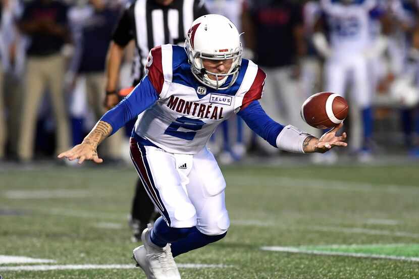 Montreal Alouettes quarterback Johnny Manziel (2) loses control of the ball during the first...