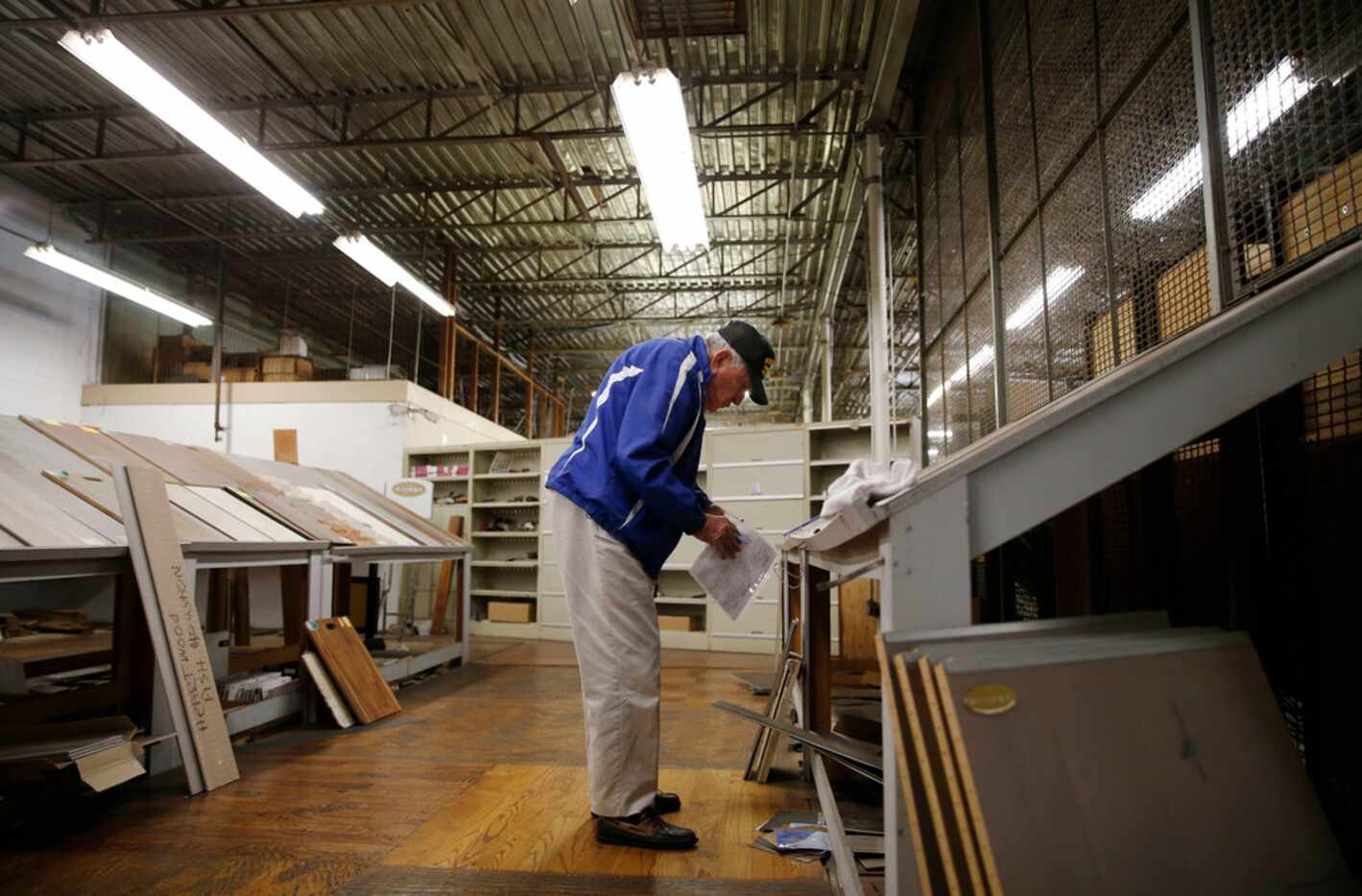Chester Hollingsworth works on inventory at S&H Distributing in Dallas.