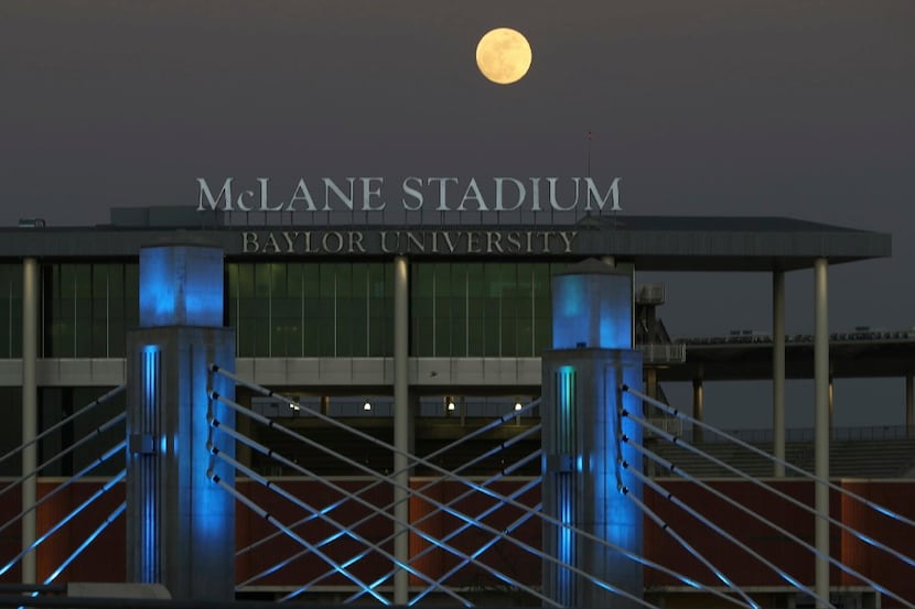 CORRECTS THE SOURCE TO BAYLOR UNIVERSITY - A full moon rises over the Brazos River near...