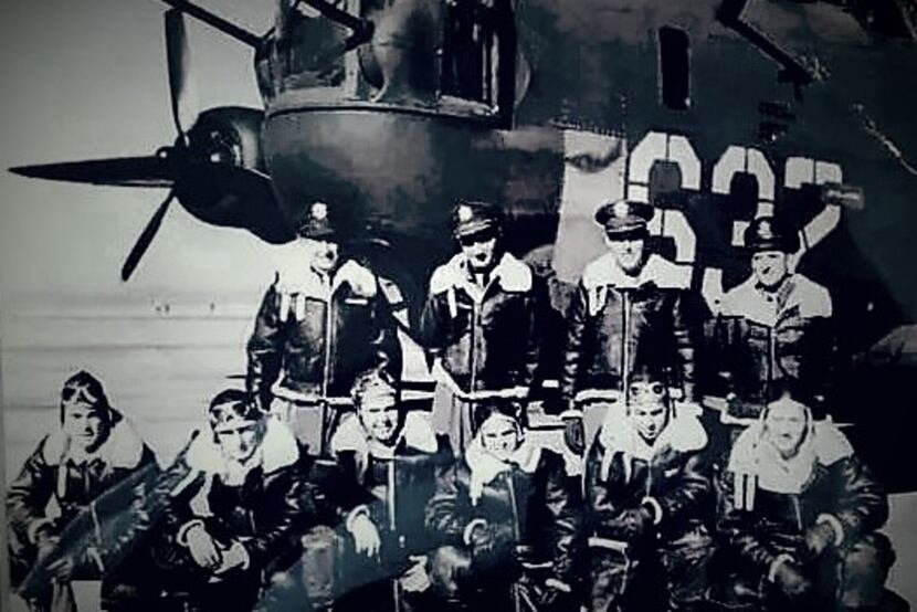 Edward Mims (front row, third from left) is shown with a B-24 Liberator crew. It's unknown...