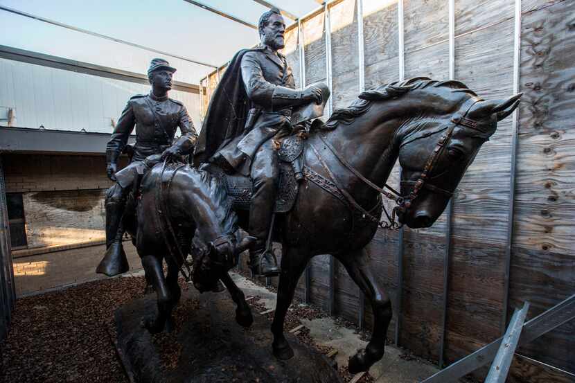 A sculpture of Confederate Gen. Robert E. Lee and a young soldier on horseback was kept at...