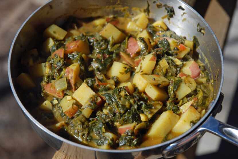 Curried Spinach and Red Potatoes can be served over jasmine rice.