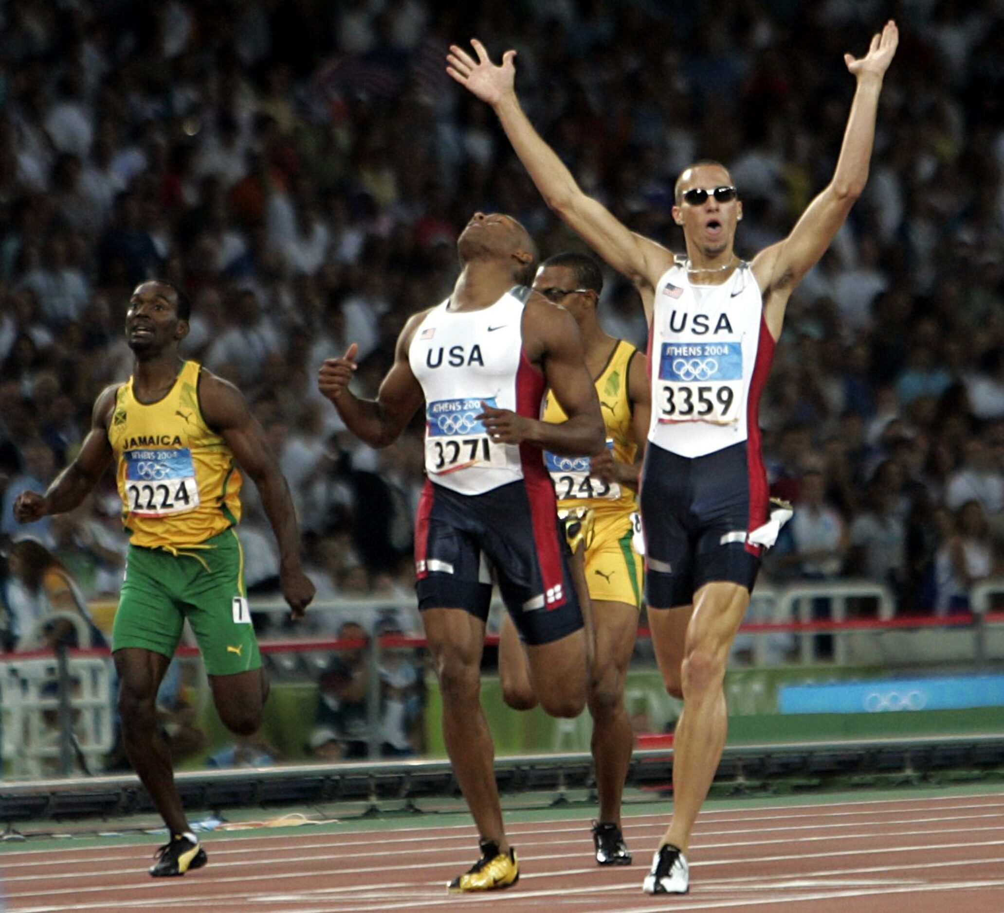 2004 Summer Olympic Games: Jeremy Wariner (3359) of the U.S. beats teammate Otis Harris to...