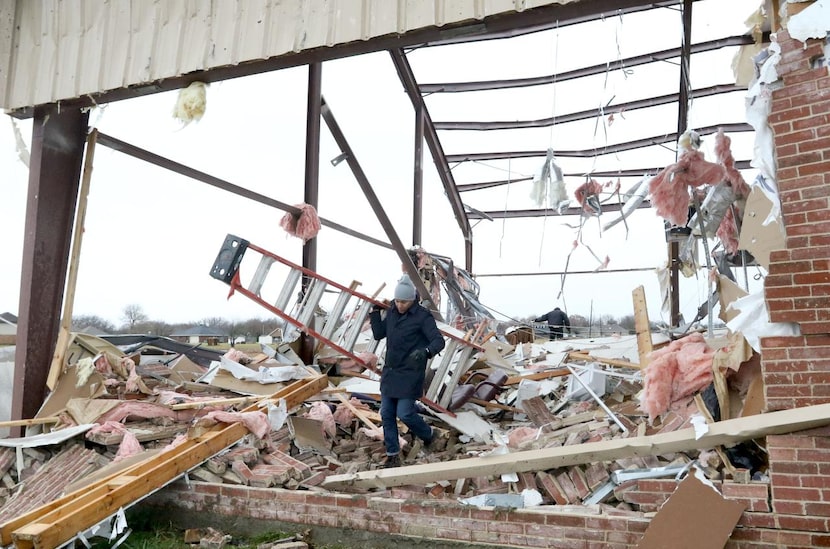 
Jarryd Osborne, a member at Harvest of Praise Ministry, helped clean up some of the damage...