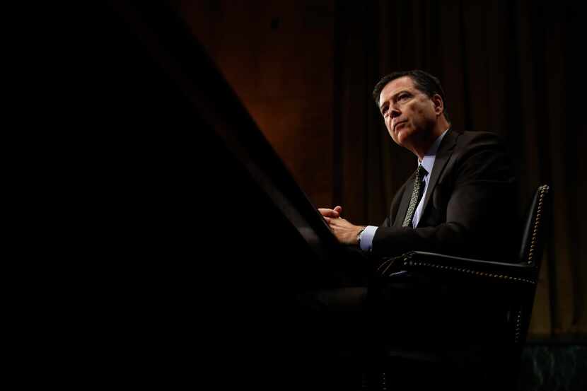 In this May 3 photo, FBI Director James Comey listens while testifying on Capitol Hill in...