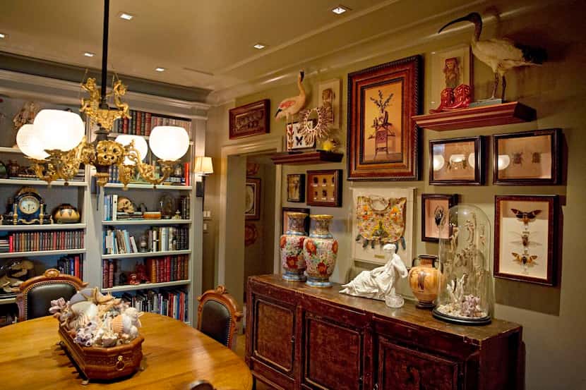 
The dining room doubles as a library and features a broad bookcase filled with special...