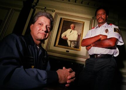 Maintenance man Fernando Ramirez and security guard Jonas Griffin stand in front of a...