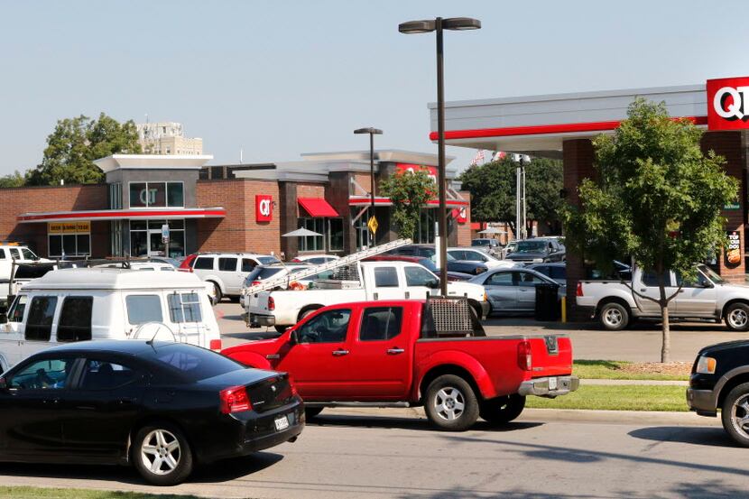 Motorist wait in line to purchase gas at Quik Trip located at 511 South Zang Blvd in Dallas...