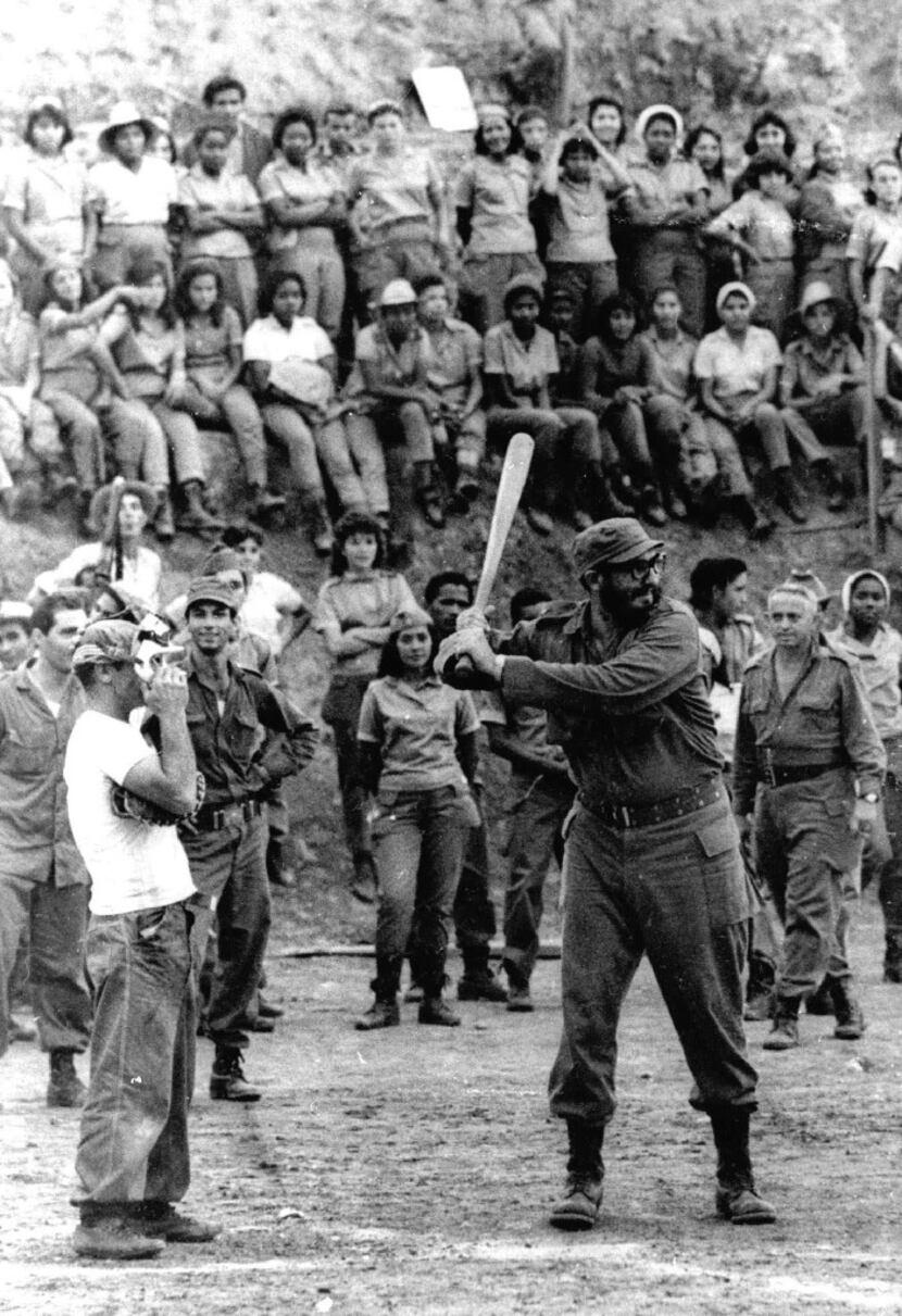Fidel Castro plays baseball in July 1962 in Cuba.
