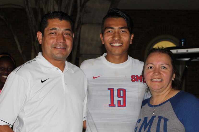Nicky Hernandez (center) with his parents at an SMU soccer game. Hernandez will be playing...