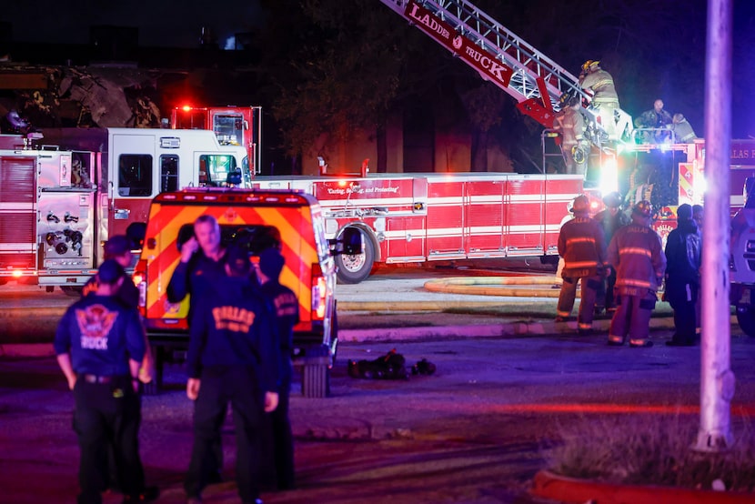 Dallas Fire-Rescue works the scene of a fire at Nolan Estes Plaza, Tuesday, Dec. 3, 2024, in...