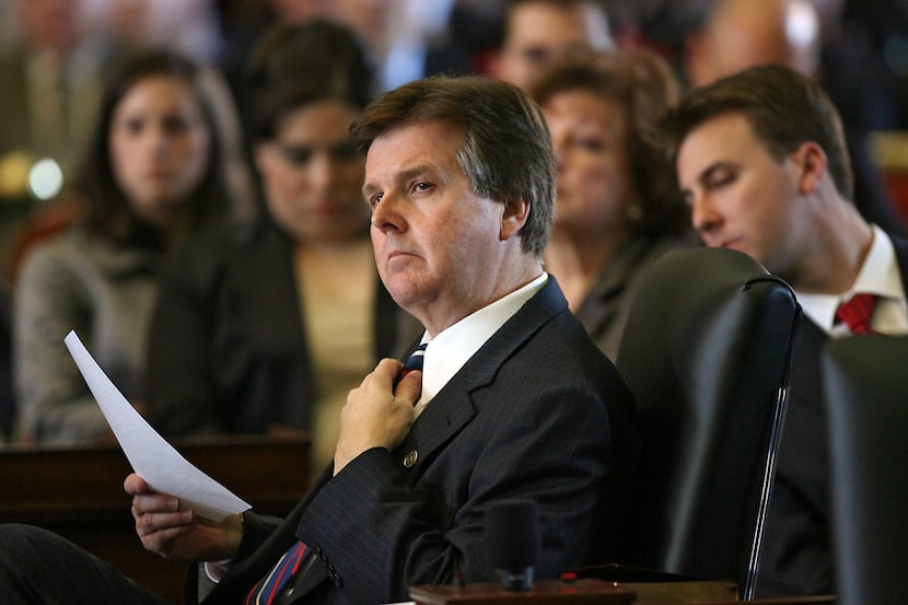 State Sen. Dan Patrick, R-Houston, watches from the Senate floor during the 80th Texas...