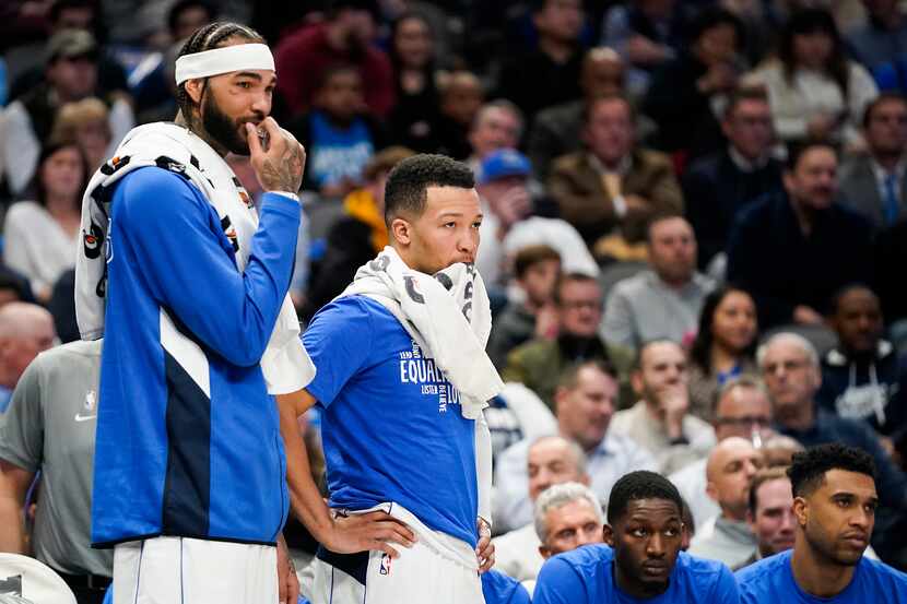 Dallas Mavericks center Willie Cauley-Stein (left) and guard Jalen Brunson watch from the...