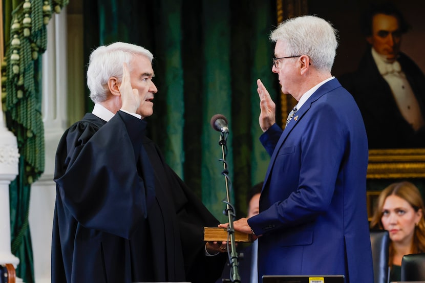 Texas Supreme Court Chief Justice Nathan Hecht swears in Lt. Gov. Dan Patrick before the...