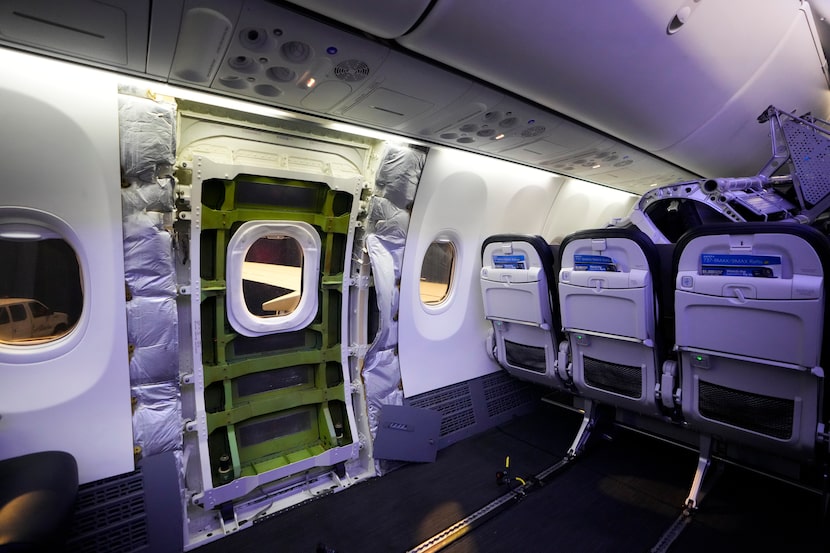 FILE - A door plug area of an Alaska Airlines Boeing 737 Max 9, with paneling removed, is...