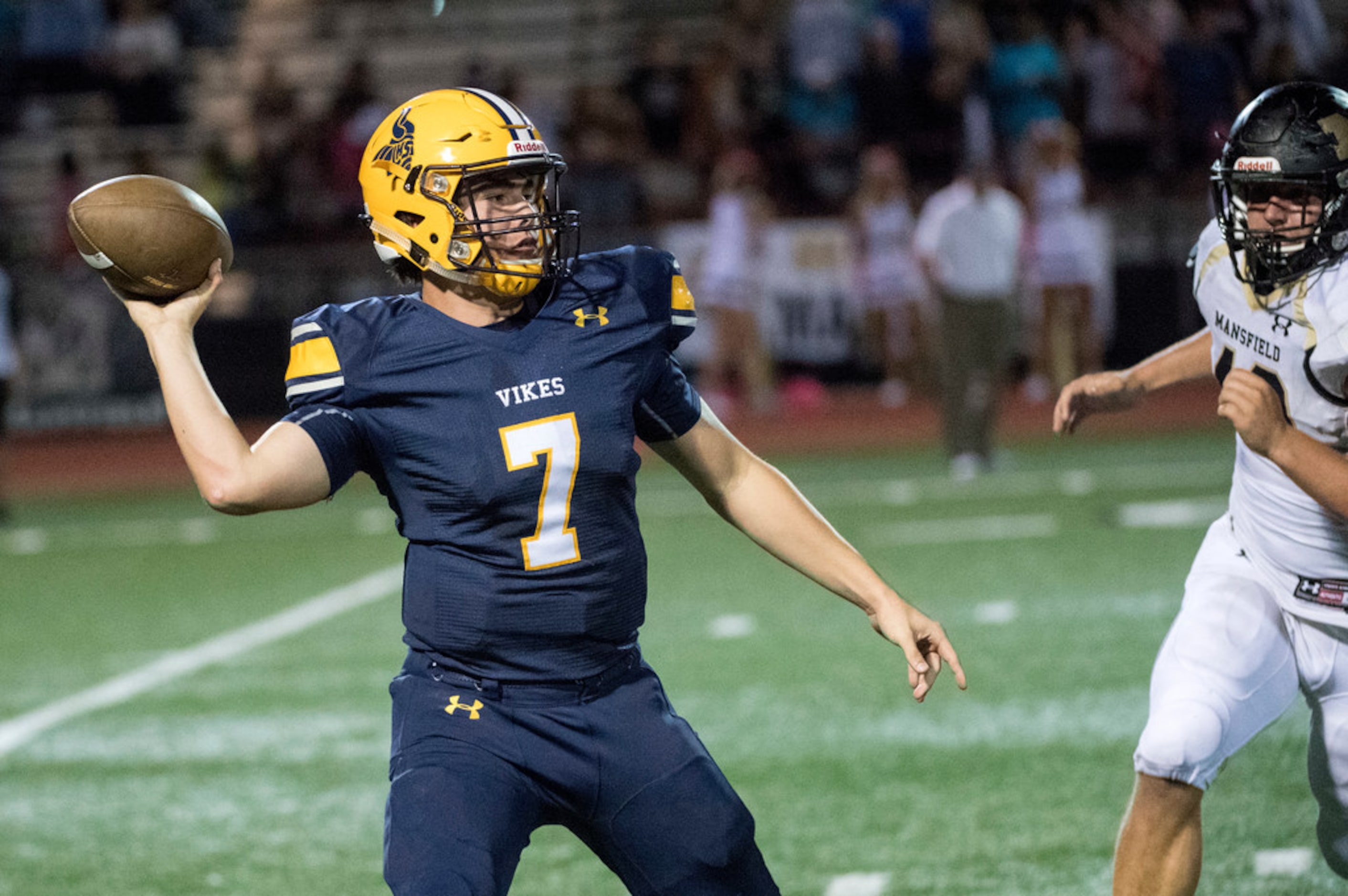 Arlington Lamar sophomore quarterback Jack Dawson (7) looks to pass against Mansfield in the...