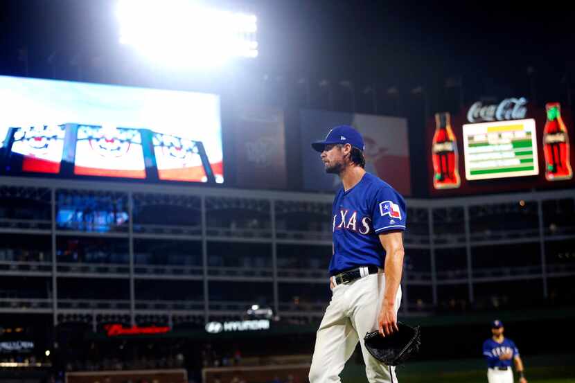 After the Texas Rangers turned a double pay to end the sixth inning, starting pitcher Cole...