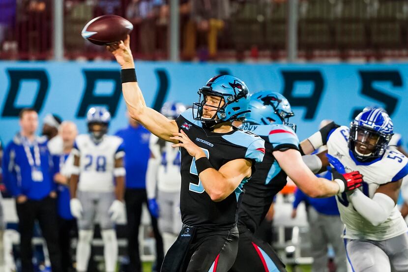 Dallas Renegades quarterback Philip Nelson (9) throws a pass during the second half of an...