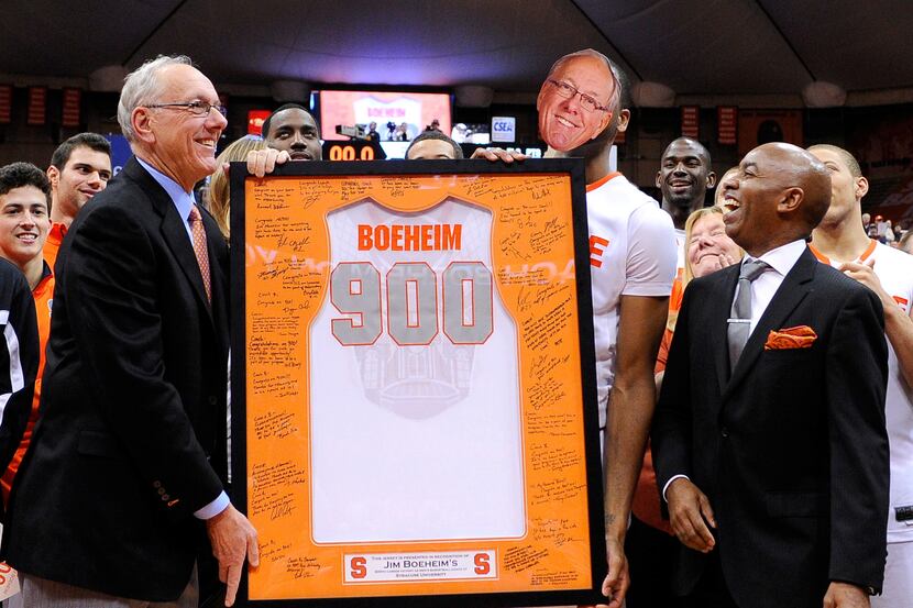 Dec 17, 2012; Syracuse, NY, USA; Syracuse Orange head coach Jim Boeheim is presented a...