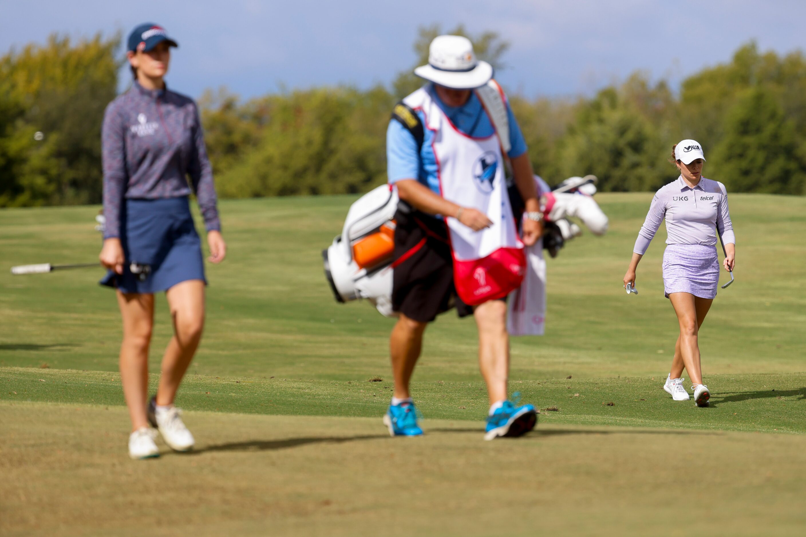 Cheyenne Knight of United States (left) and Gaby Lopez of Mexico walks on the 10th fairway...