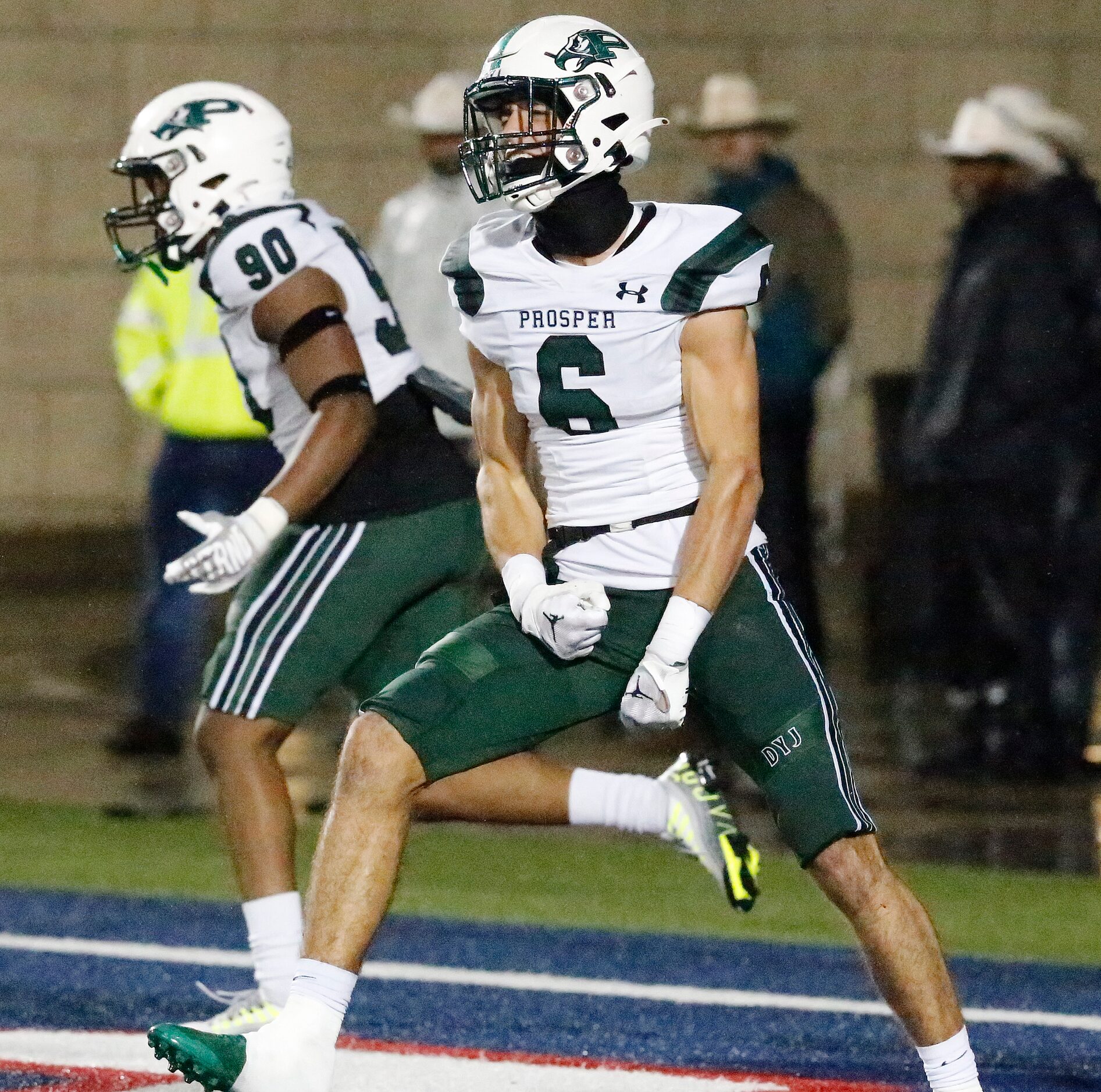 Prosper High School defensive back Adam Due (6) celebrates blocking a punt for a safety...