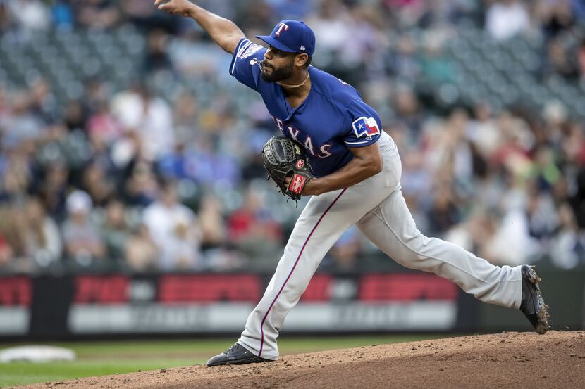 SEATTLE, WA - JULY 23: Reliever Pedro Payano #51 of the Texas Rangers delivers a pitch...