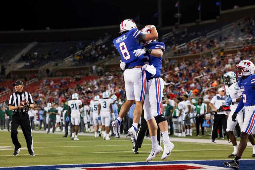 Southern Methodist Mustangs quarterback Tanner Mordecai (8) celebrates Southern Methodist...