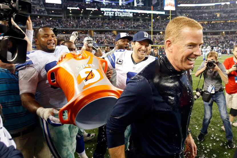 Dallas Cowboys head coach Jason Garrett is all laughs after getting dunked with sports drink...
