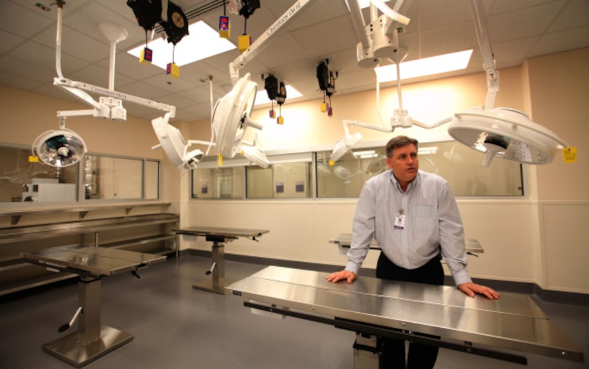 James Bias, former president and CEO of the SPCA of Texas, in one of the facility's...