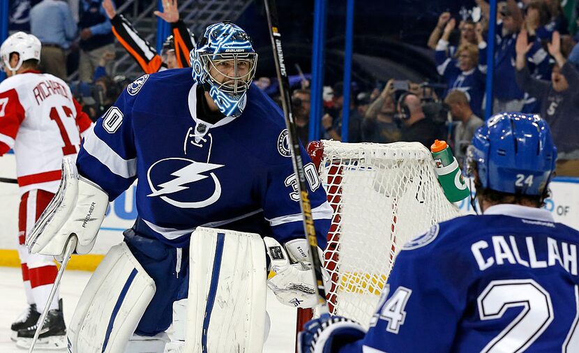 TAMPA, FL - APRIL 21:  Ben Bishop #30 of the Tampa Bay Lightning celebrates with Ryan...