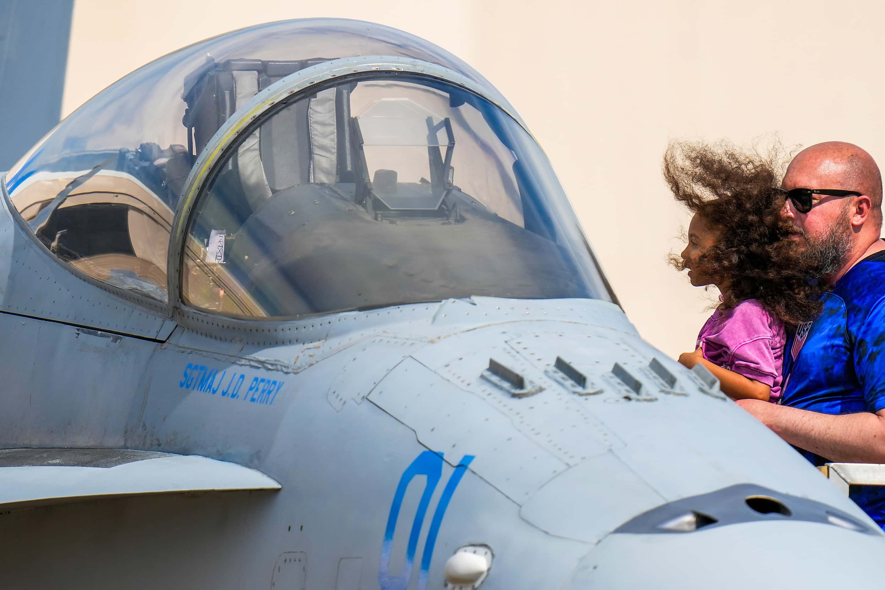 A youngster gets a close up look at an aircraft  at the Wings Over Cowtown Airshow on...