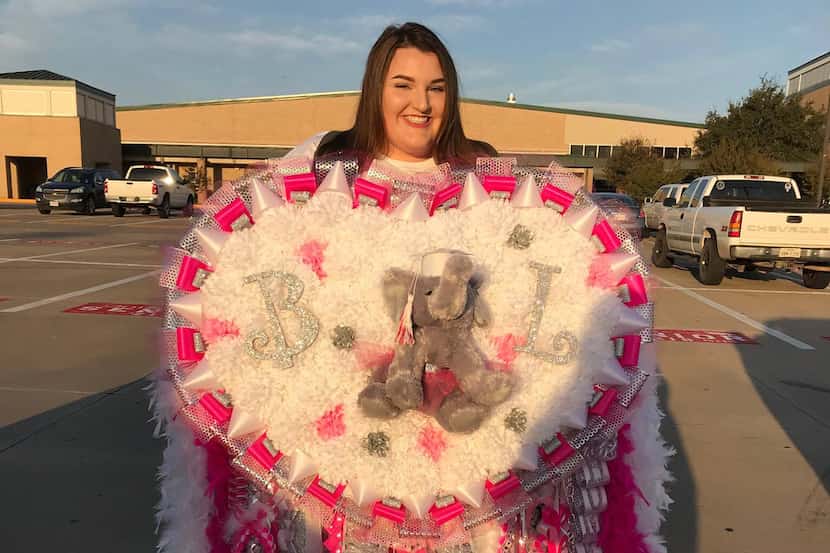 Where's Brooke Boyd? She's hidden behind this giant homecoming mum before the big football...