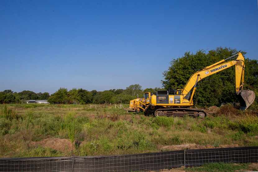 A tractor moved dirt this week on the property where Camden Homes will break ground on a...